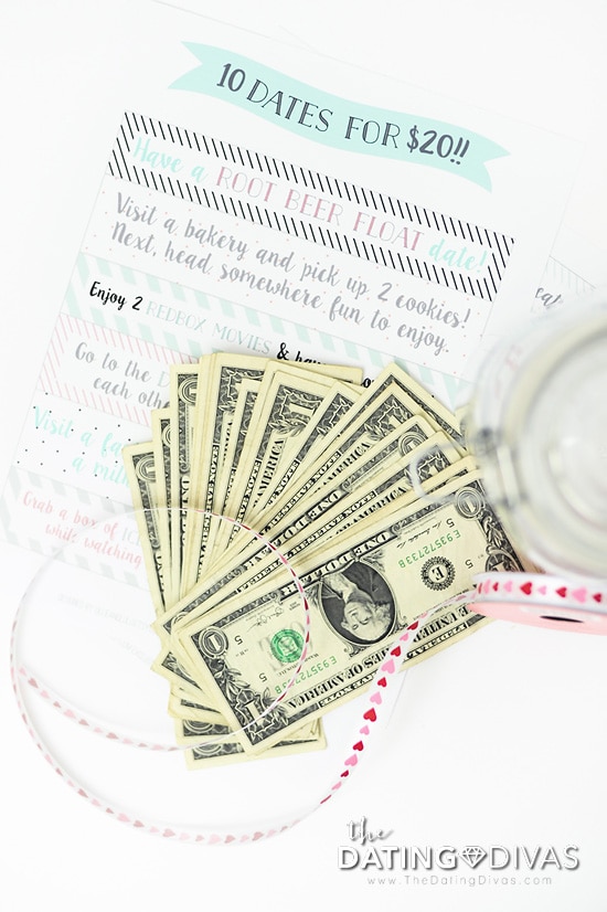 Dollar bills splayed out ready to go into Date Night Jar