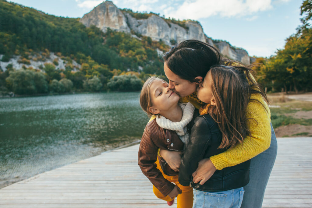 Family spending time together camping.