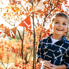 Little boy stands in front of Thanksgiving printable | The Dating Divas