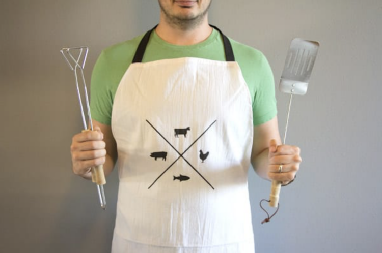 A man trying out his Man Apron this Christmas | The Dating Divas