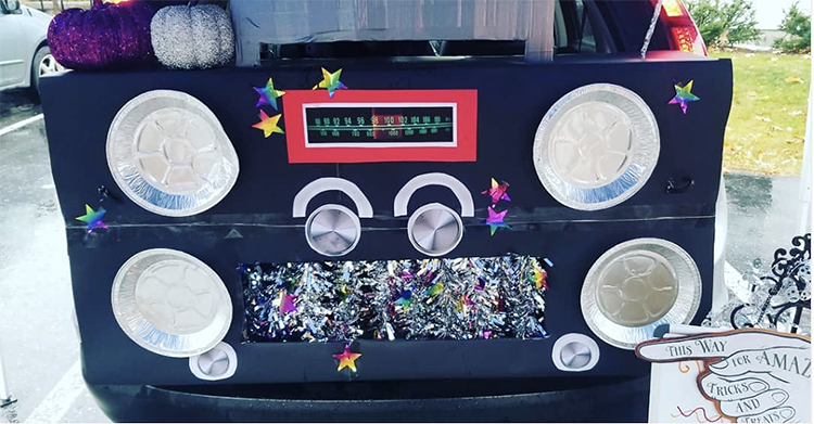 A trunk decorated as a large music player for a trunk or treat Halloween event. A unique trunk or treat decorating idea. | The Dating Divas