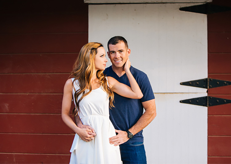 Snuggle up in front of a barn for your next photoshoot. | The Dating Divas