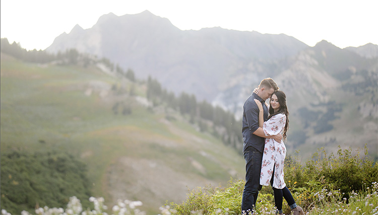 Cute couple poses are possible with a mountain location. | The Dating Divas
