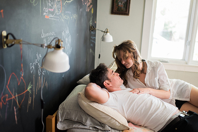 Non-Professional couple on the bed