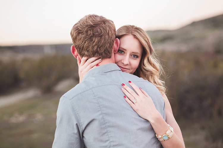 Show of your engagement ring during your couple photoshoot. | The Dating Divas