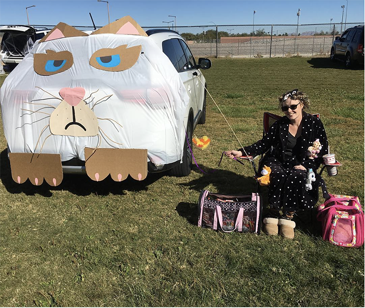 Trunk decorated as a large cat a great trunk or treat idea for Halloween | The Dating Divas