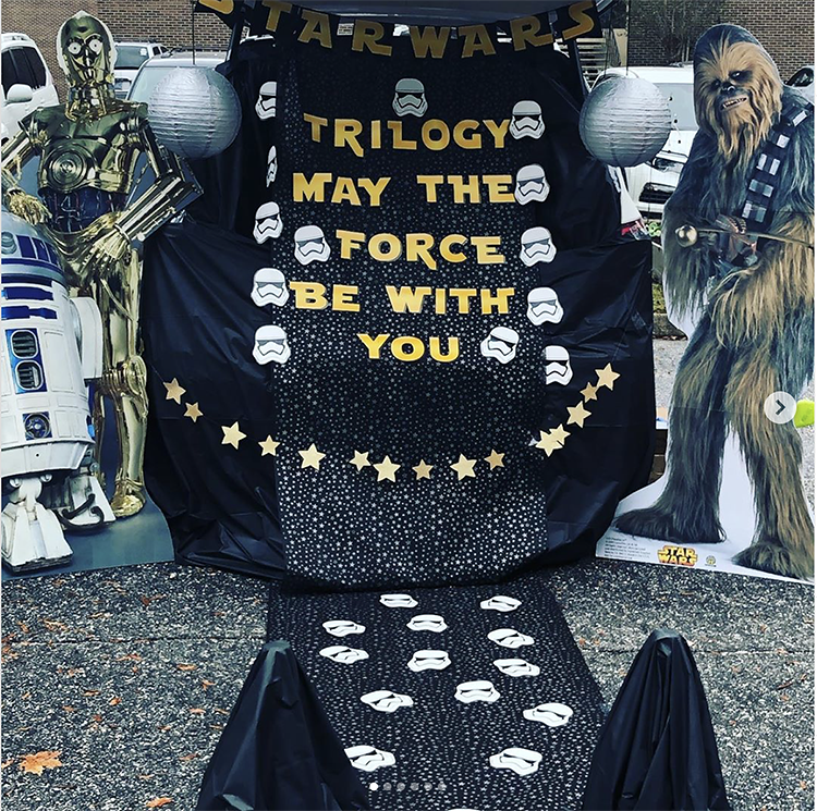 Trunk decorated with a theme for the movie Star Wars. This is a great trunk or treat idea | The Dating Divas