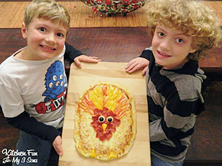 Let the kids make one of these Thanksgiving food ideas - a turkey pizza! | The Dating Divas