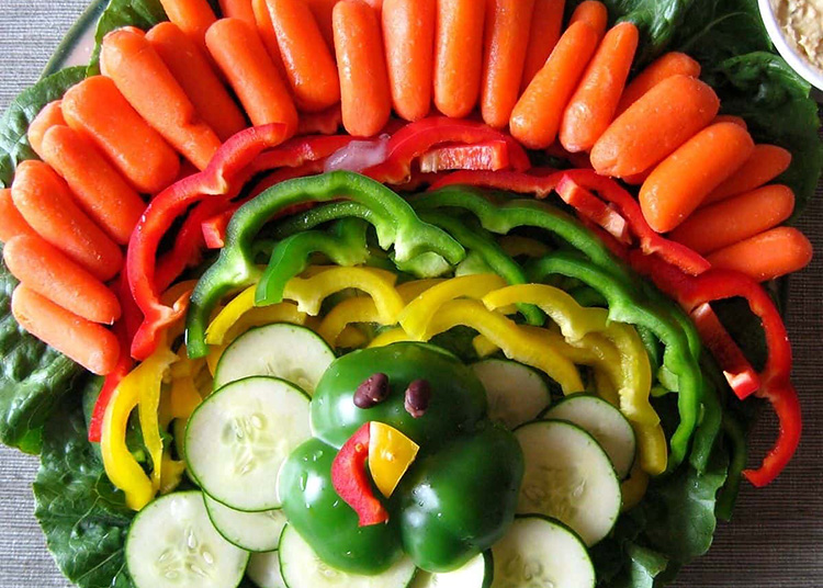 A cute veggie tray is a great option for Thanksgiving finger food. | The Dating Divas
