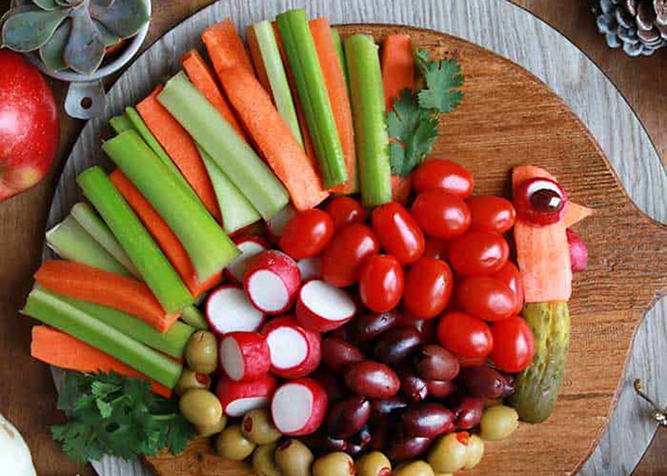 Thanksgiving snacks are best when they are finger foods. This turkey veggie tray fits the bill. | The Dating Divas