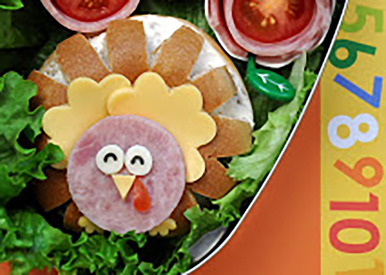 An easy turkey-themed bagel sandwich is a great Thanksgiving finger food. | The Dating Divas