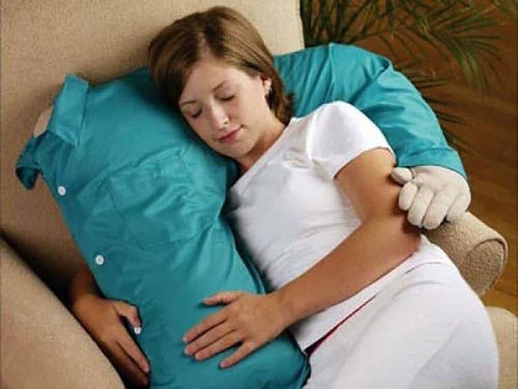 A boyfriend shaped pillow that makes for funny white elephant gifts. | The Dating Divas