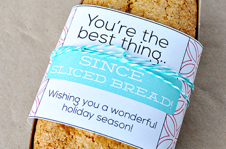 A loaf of bread with a holiday gift tag wrapped around the front of it | The Dating Divas