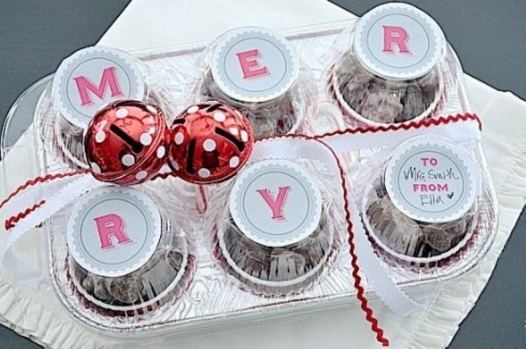 Muffin tin shaped Christmas printables decorating a tray of goodies | The Dating Divas