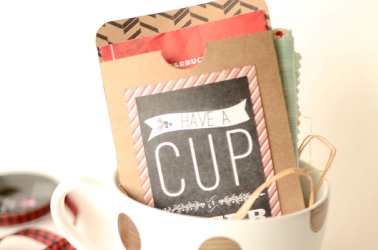 Hot cocoa packets and a gift card inside of a mug | The Dating Divas