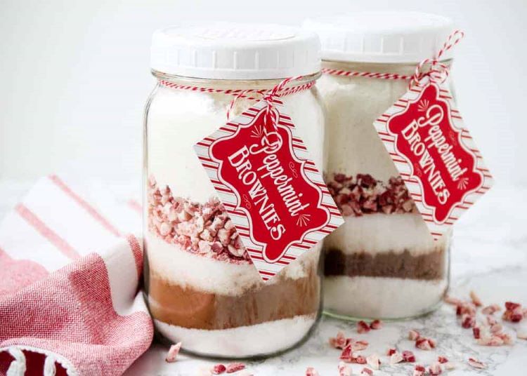 Glass mason jars filled with homemade peppermint brownie mix | The Dating Divas