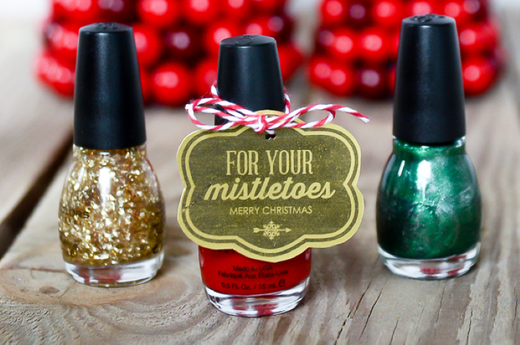 Nail polish bottles tied with a Christmas gift tag | The Dating Divas