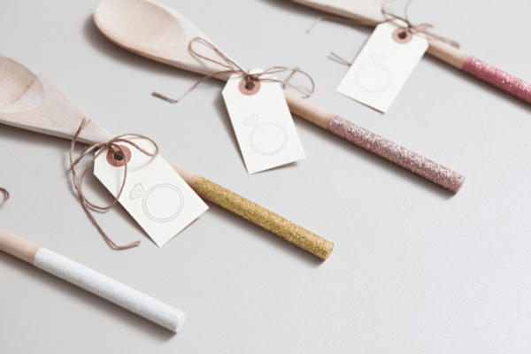 Spoons dipped in glitter with ring tag for bridal shower | The Dating Divas