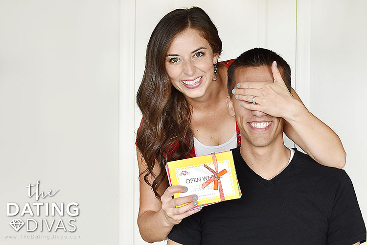 Woman surprising man with a meaningful Christmas gift | The Dating Divas