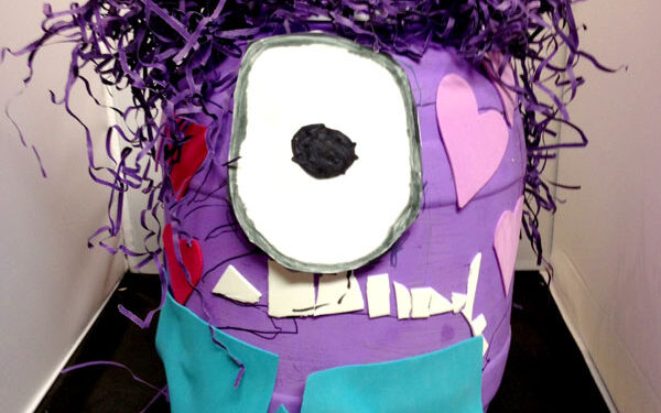 Bright purple Minion with crazy purple hair turned into a Valentine's Day box | The Dating Divas