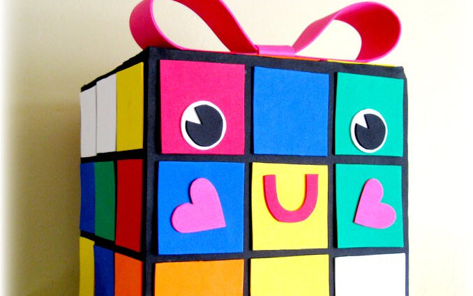 Rubik's cube valentines box with pink bow on top | The Dating Divas