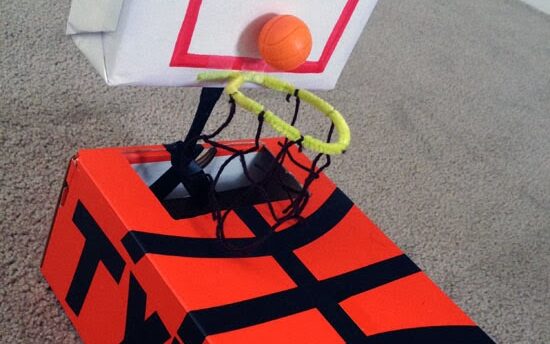 Bright orange box with a basketball hoop and personalized name on the side for Valentine's Day | The Dating Divas