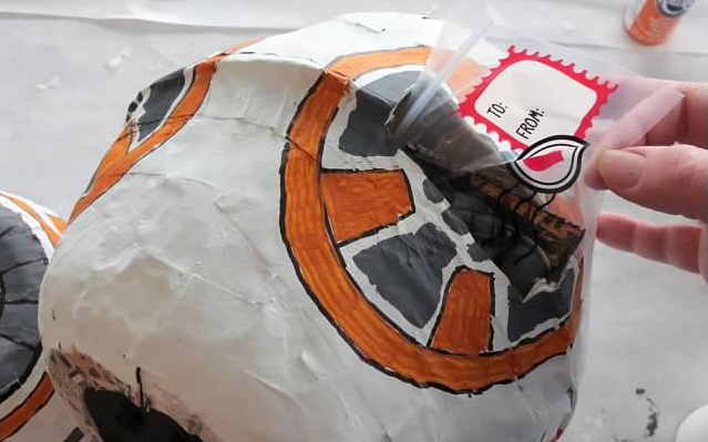 Star Wars-themed BB-8 Valentine's Day box with a card going into the box | The Dating Divas 