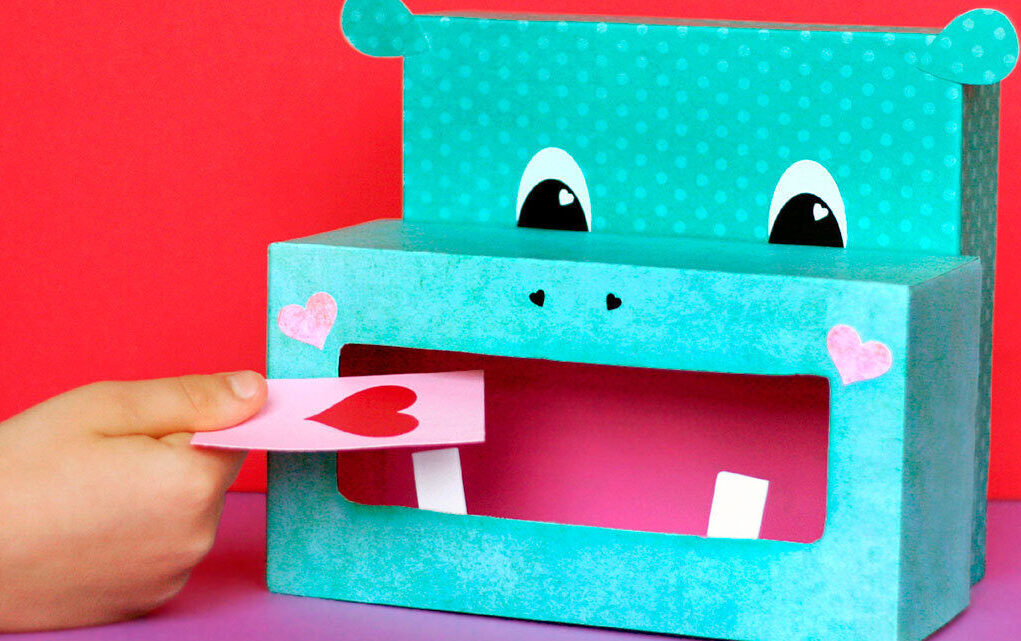 Bright blue and pink hippo Valentine's Day box by Giggles Galore | The Dating Divas