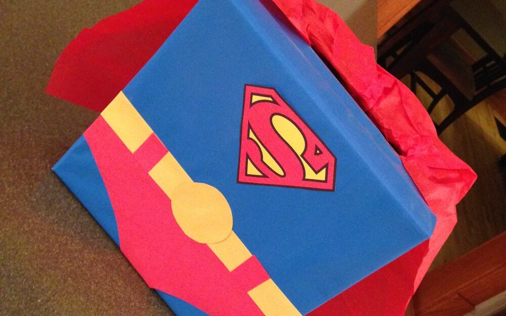 An ordinary box converted into a Superman-themed Valentine's Day box for cards | The Dating Divas