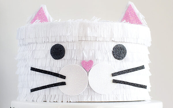 White kitty cat valentines box with sparkly pink ear | The Dating Divas