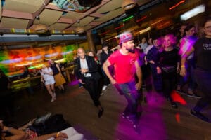 People salsa dancing for a perfect date night idea. | The Dating Diva