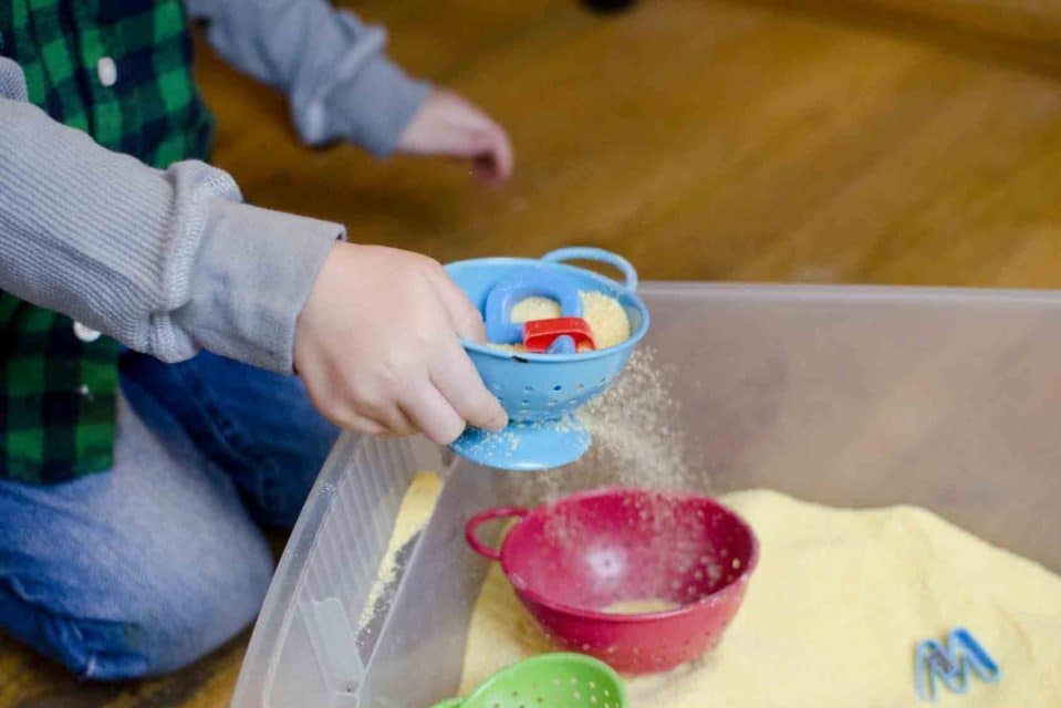 Sand sifting toddler activities | The Dating Divas