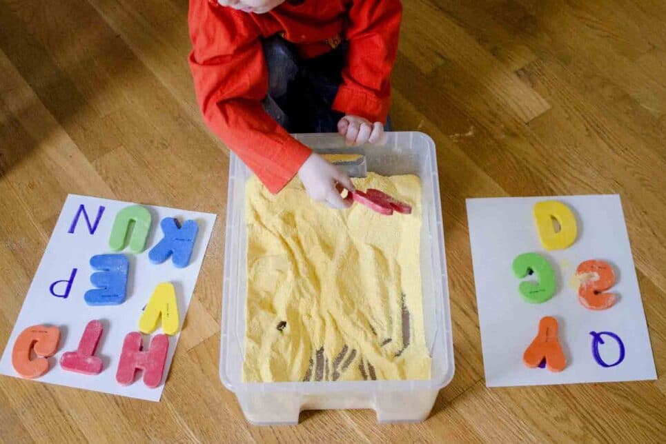 Sandbox letter hunt preschool activities at home | The Dating Divas