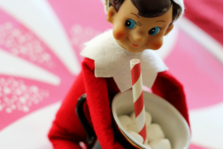 Elf on the shelf drinking hot cocoa | The Dating Divas