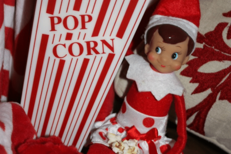 Elf on the shelf eating popcorn | The Dating Divas