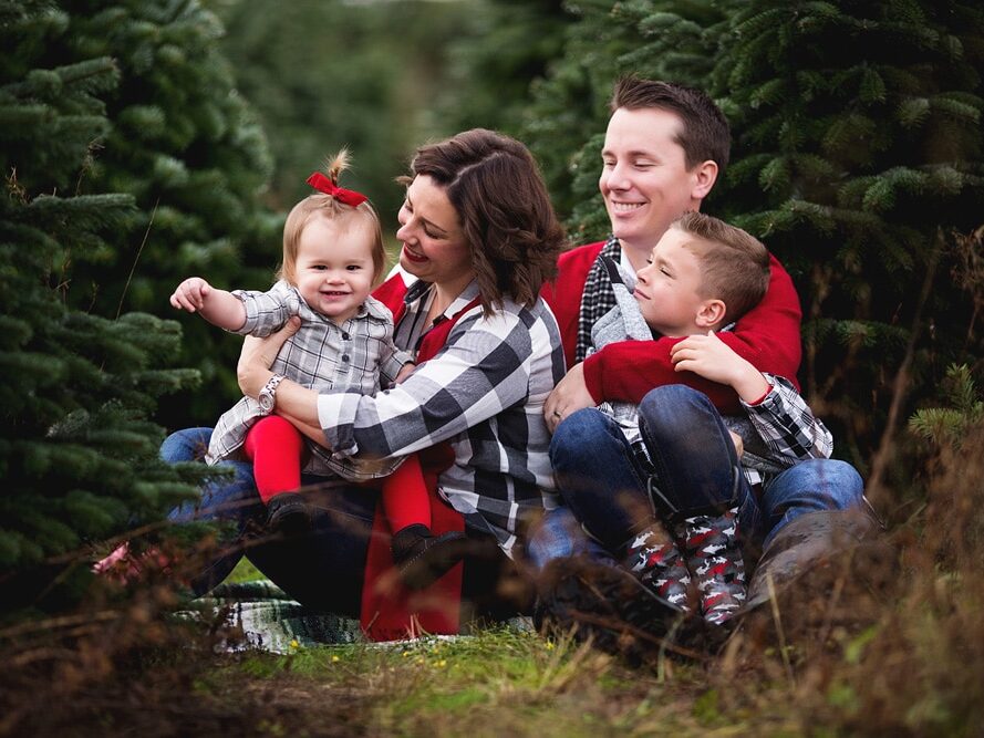 Family Christmas card ideas with black, white, and red outfits | The Dating Divas