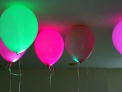 LED glow-in-the-dark balloons are a fun birthday decoration idea for an evening in the dark | The Dating Divas