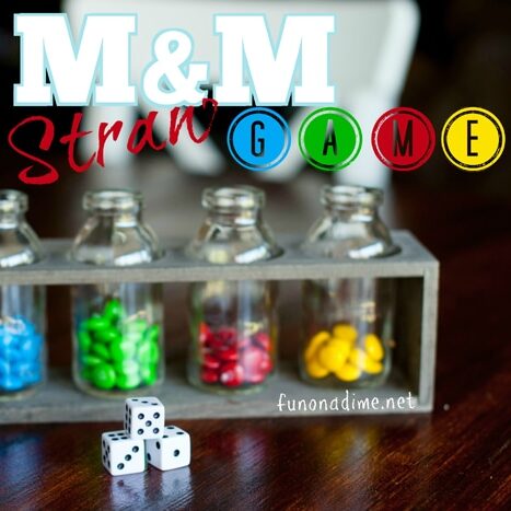 Play a fun and colorful M&M straw game with dice for your New Year's Party | The Dating Divas