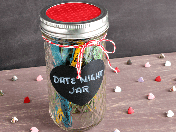 A jar filled with date night gifts for boyfriends | The Dating Divas