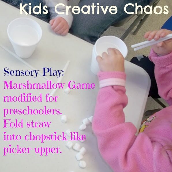 Fun sensory fine motor skill game for toddler: pick up marshmallows with folded straws | The Dating Divas