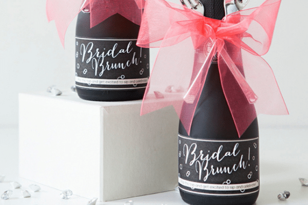 Bridal shower invitation DIY on bubbly bottle | The Dating Divas