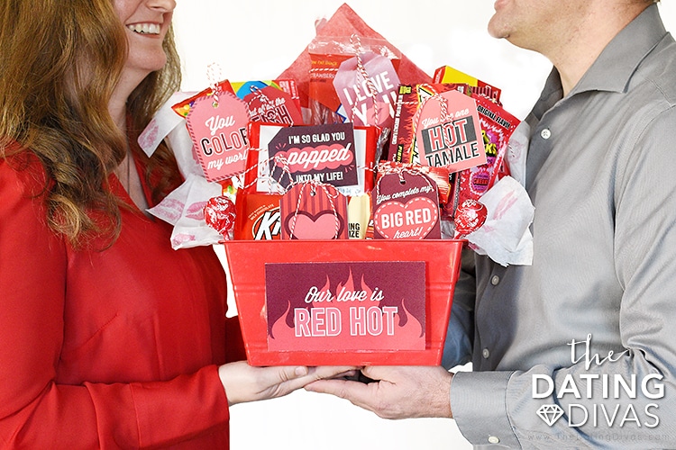 A couple enjoying their Red Hot gift basket as a Valentine's gift idea | The Dating Divas