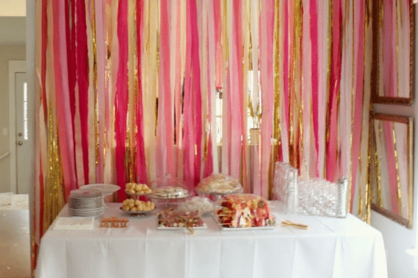 Multi-colored streamer backdrop for party | The Dating Divas