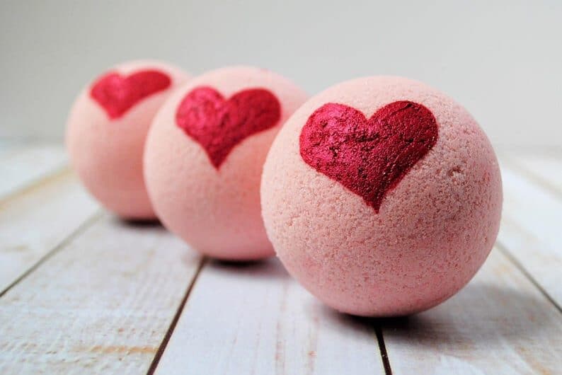Use a tray of bath bombs as Valentine decorations for your bathroom. | The Dating Divas