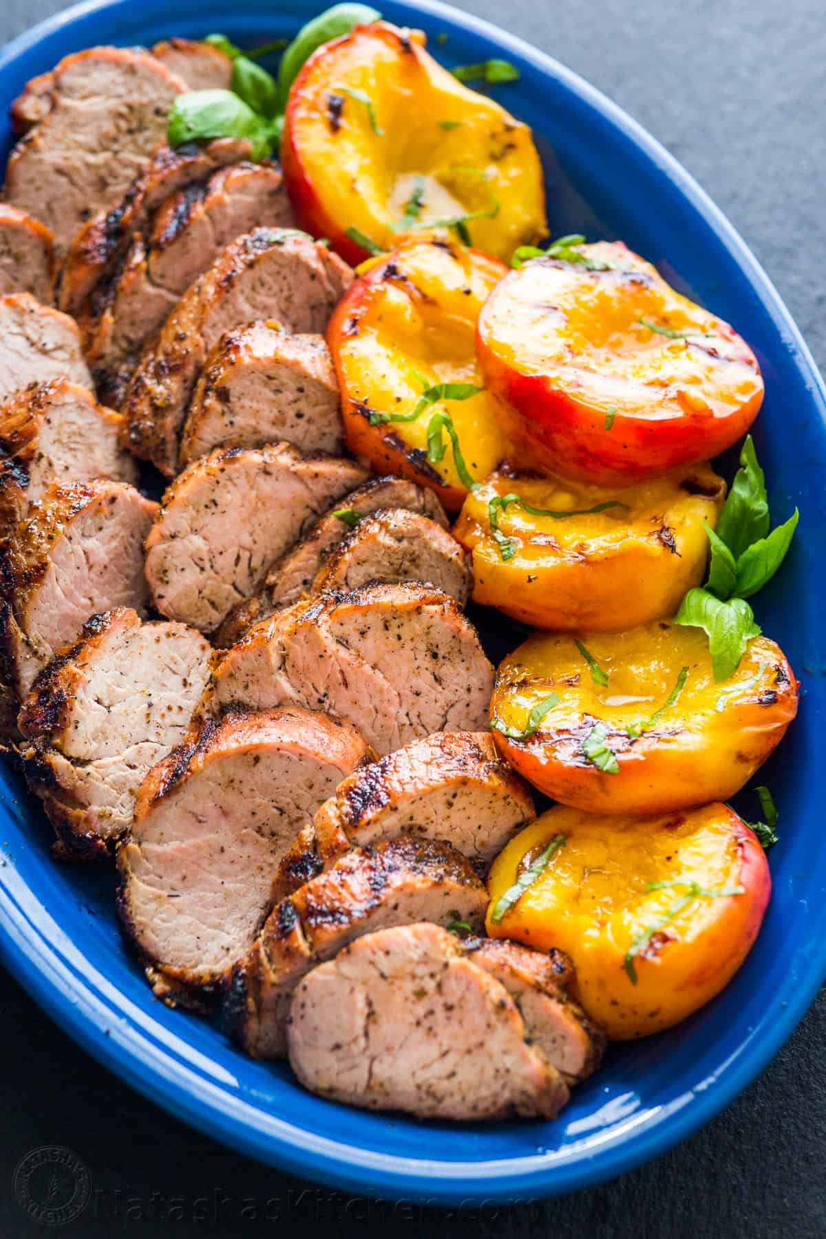 This Grilled Pork Tenderloin with Peaches is great for your Easter dinner ideas | The Dating Divas 