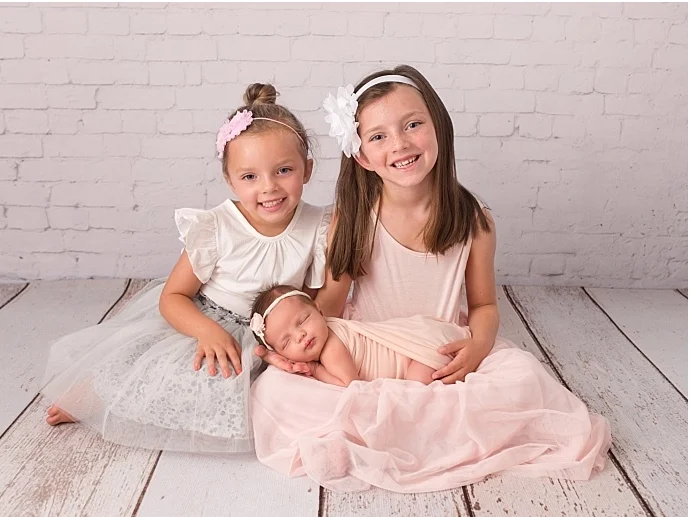 Sibling poses are sure to be a favorite from your baby pictures | The Dating Divas