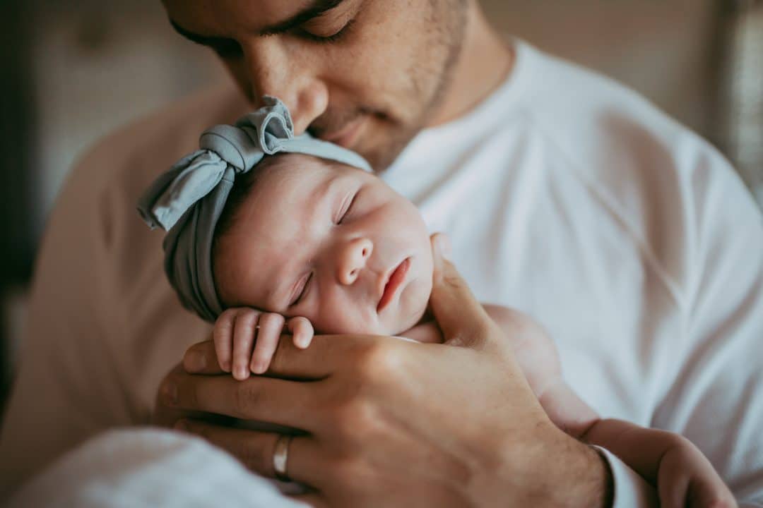 Newborn photography ideas: Try posing baby with just dad for a sweet photo | The Dating Divas