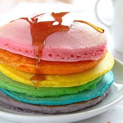 Start your day off right with a stack of rainbow pancakes for your St. Patrick's Day food | The Dating Divas