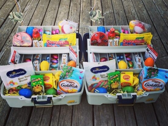 A tackle box of fish and worm-themed treats for a fisherman's Easter basket idea | The Dating Divas