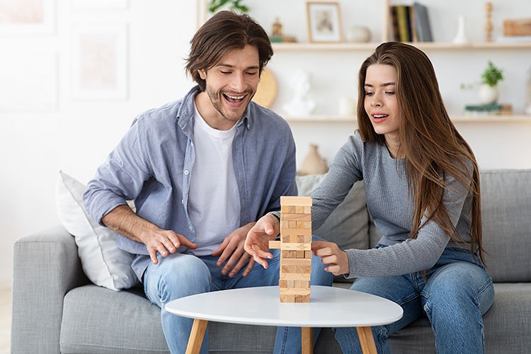 Have fun playing a game of sexy Jenga for date night. | The Dating Divas